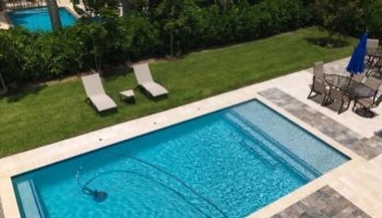 Piscine interrate e distanze dai confini: cosa prevede la legge